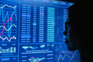 Business analyst reviewing an AI-powered customer analytics dashboard to improve personalization, customer experience, and data-driven decision-making.